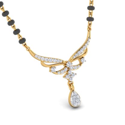 Close-up of yellow gold mangalsutra pendant showing the pear-shaped diamond drop